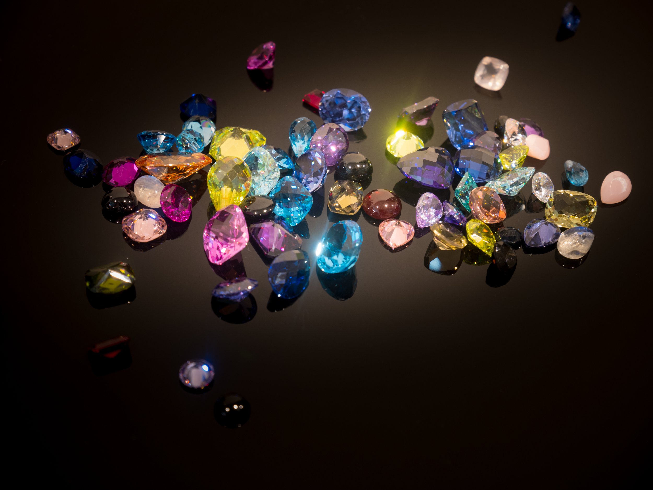 multi-color-gemstone-gems-black-shine-table-2